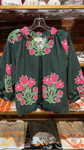 Green with a pop of hot pink top