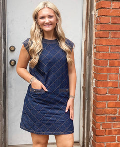 Dark denim dress with brown stitching